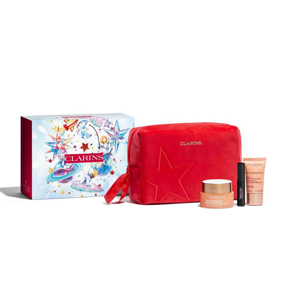 Packshot of Clarins Extra Firming Holiday Season Gift Set components: gift package, makeup bag, and selected products.