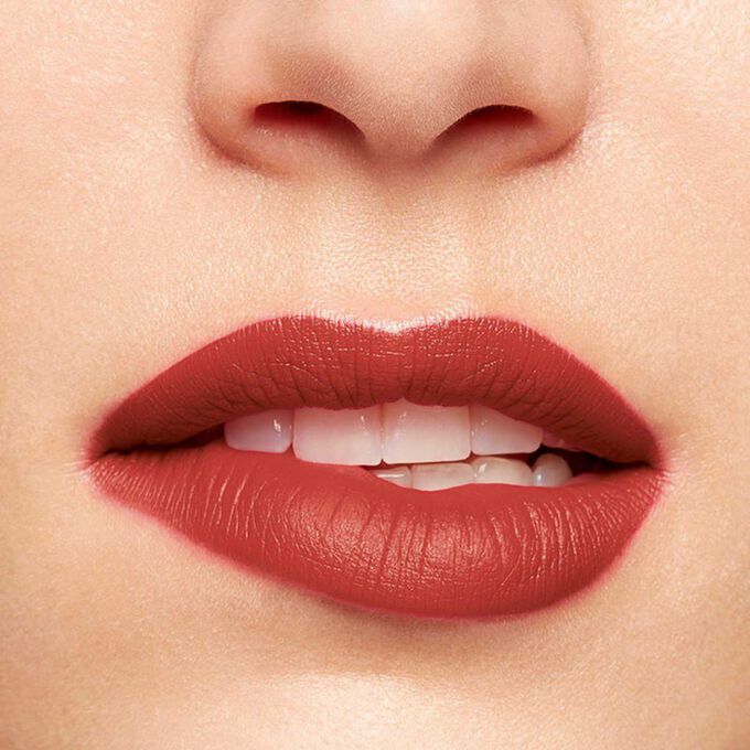 Close-up of a woman’s lips, showcasing the hydration and colour results after applying Joli Rouge in Shade 742 V