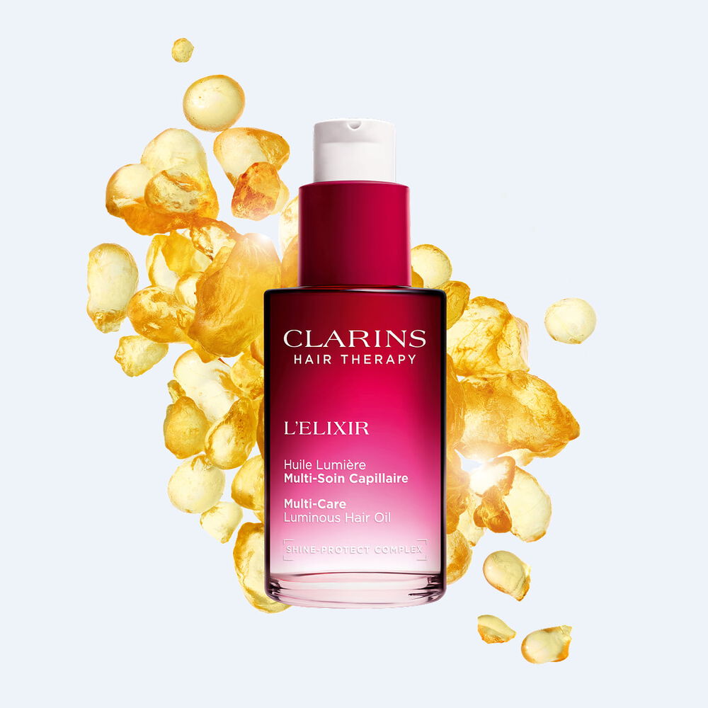 Nourishing and hydrating hair oil elixir with a luminous shine effect to protect and revitalize all hair types daily