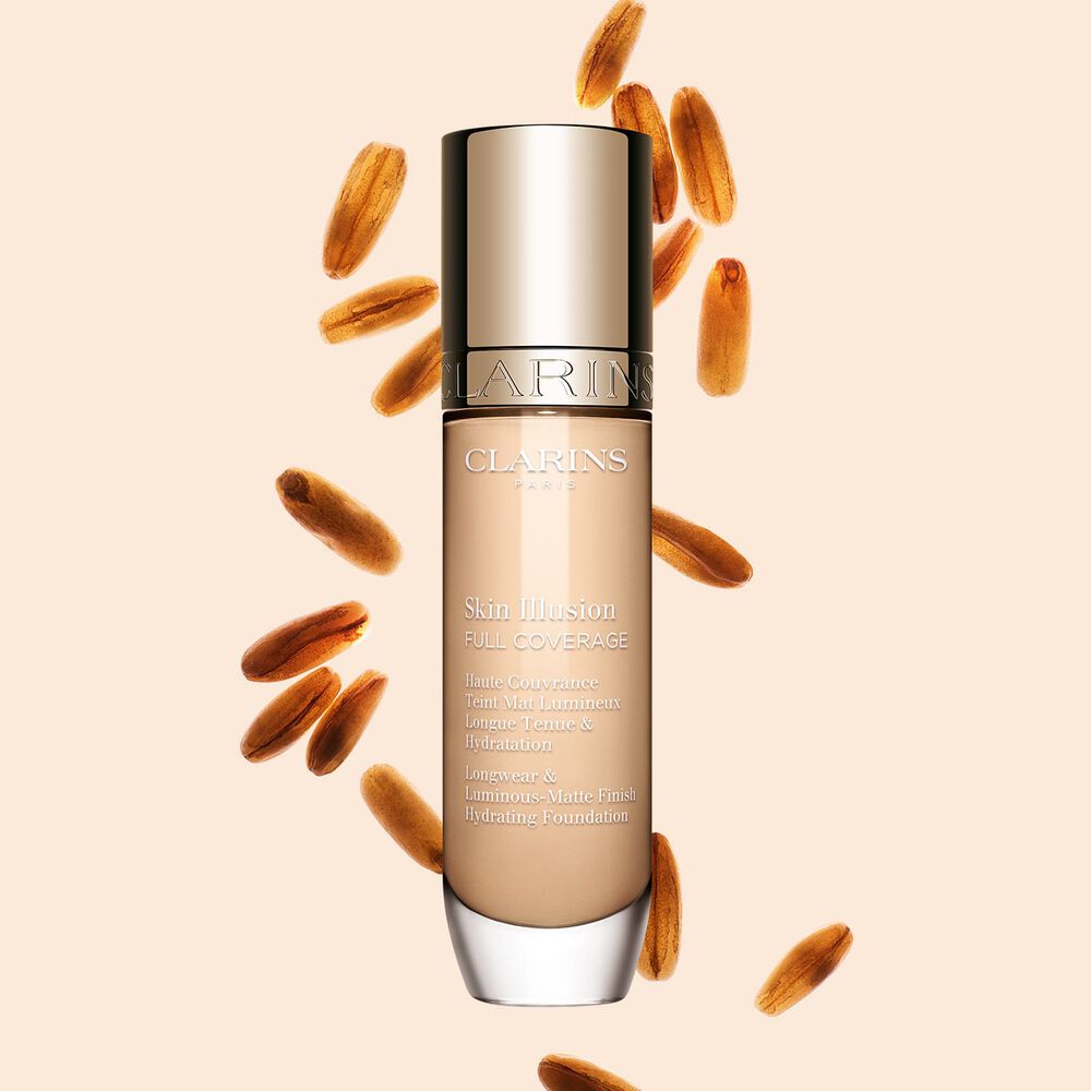 Clarins Skin Illusion Full Coverage showcasing its sleek design and vibrant packaging, the ideal foundation for a flawless & natural complexion.