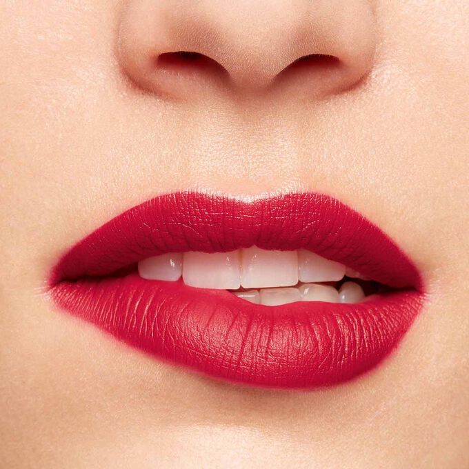 Close-up of a woman’s lips, showcasing the hydration and colour results after applying Joli Rouge in Shade 742 V