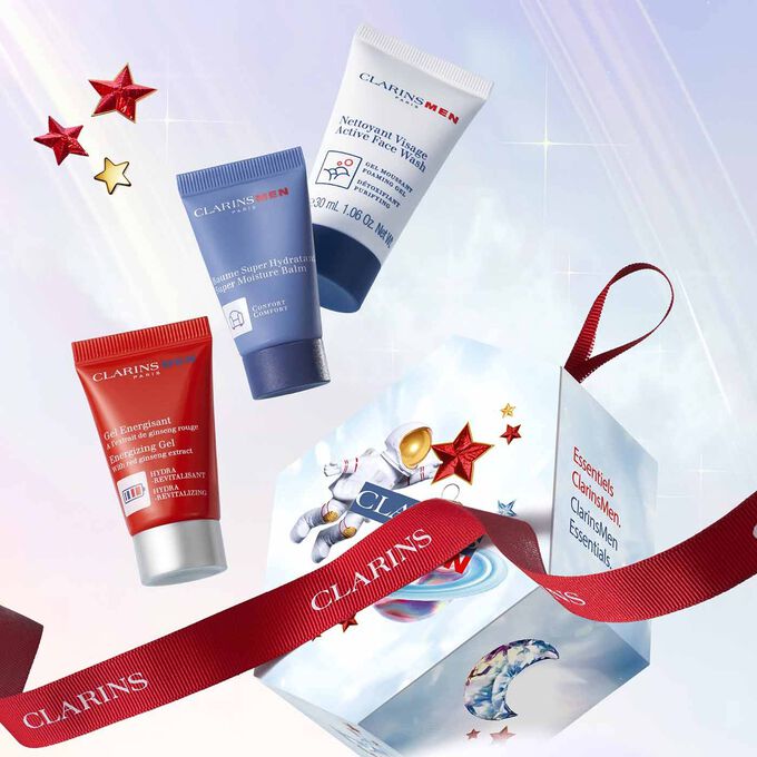 Packshot of ClarinsMen Holiday Season Gift Set: a gift package, a Face wash, an energising Gel and a Super-moisturising balm.