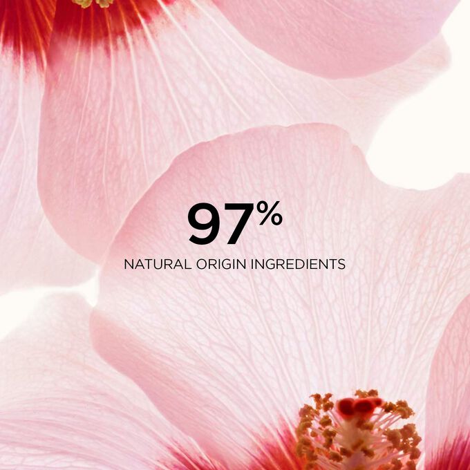 Close-up of two hibiscus flowers to highlight that 97% of the ingredients in the Renew-Plus Body Serum are of natural origin.