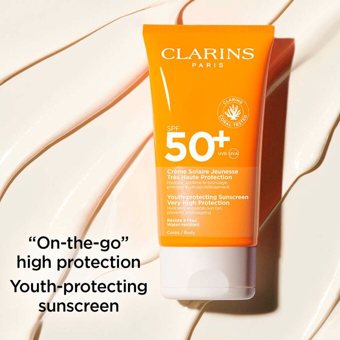Clarins Youth-Protecting Sunscreen High Protection SPF 50 with text highlighting its high protection on-the-go format.