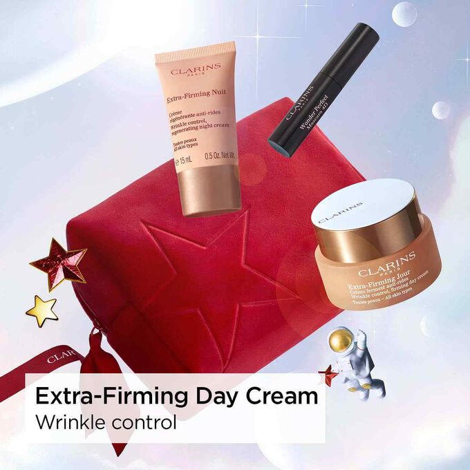 Photoshoot of Clarins Extra Firming Holiday Season Gift Set: Day & Night Creams for wrinkle control and anti-aging benefits.